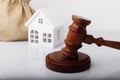 Real estate sale auction concept. Gavel and house model Royalty Free Stock Photo