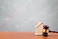 Real estate sale auction concept - gavel and house model on the wooden table Royalty Free Stock Photo