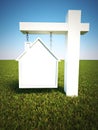 Real estate sign in the shape of a house with a sky background and room for text or copy space Royalty Free Stock Photo