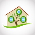 Real estate symbol of ecological house with tree and leaves