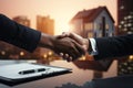 Real estate victory businessman seals success with a symbolic handshake