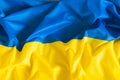 Real fabric waving flag of Ukraine. National yellow and blue Ukrainian flag for Independence day Royalty Free Stock Photo