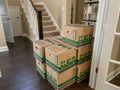 A real families  moving boxes packed and ready for the movers to take them to their new home Royalty Free Stock Photo