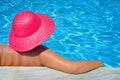 Real female beauty relaxing in swimming pool