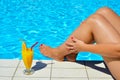 Real female beauty relaxing at swimming pool