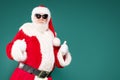 Real funny Santa Claus wearing sunglasses Royalty Free Stock Photo