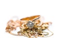 Real gold ring with diamond on gold chain close up macro shot Royalty Free Stock Photo