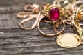 Real gold rings with diamond on weathered pine wood board close up macro shot, focus on the ring Royalty Free Stock Photo