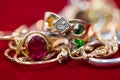 Real gold rings with diamonds, gems, chain close up shot Royalty Free Stock Photo