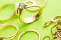 Real gold rings with diamonds, gems close up macro shot Royalty Free Stock Photo