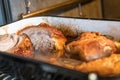 Real hearty homemade roast pork in a roaster casserole in the oven, Germany