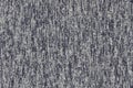Real heather knitted fabric made of synthetic fibres textured background. Colored fabric texture. Background with delicate stripe