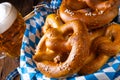 A real homemade bavarian salty pretzel with beer