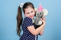 Real joy. happy childhood. Birthday. little girl playing game in playroom. small girl with soft bear toy. child Royalty Free Stock Photo