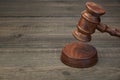 Real Judges Or Auctioneer Gavel On The Black Wooden Table