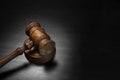 Real Judges Or Auctioneer Gavel On The Black Wooden Table