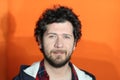 Real looking man in orange background Royalty Free Stock Photo