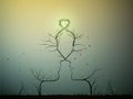 Real love never change, couple of people look like tree branches silhouettes with green heart, two profiles of lowers