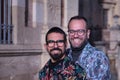 Real marriage portrait of gay couple, hugging, smiling and happy looking at camera. Concept lgtb, lgtbiq+, couples, in love, love Royalty Free Stock Photo