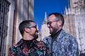 Real marriage portrait of gay couple, hugging, smiling and happy looking at each other. Concept lgtb, lgtbiq+, couples, in love, Royalty Free Stock Photo