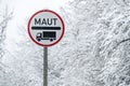 Real Maut sign for lorrys in the snow