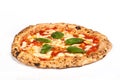 Real Neapolitan Italian pizza called margherita pizza just out of the oven in isolated in a white background