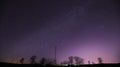 Real Night Sky Stars Above Landscape With Telecommunications Cell Phone Tower Or With Antenna. Natural Starry Sky With Royalty Free Stock Photo