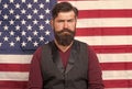 he is real patriot. serious american citizen in the election. celebration of victory. bearded hipster man being