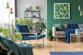 Real photo of green living room interior Royalty Free Stock Photo
