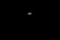 Real photo of Saturn planet with telescope