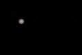 Real picture of Jupiter with satellites Europa, Io, Ganymede, Callisto with telescope and DSLR