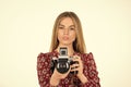 she real professional. professional skilled female photographer. happy girl make photo with old fashioned camera. modern