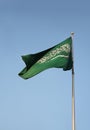 Real Saudi Arabia flag waves in the pole