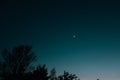 Real sky with stars and crescent. Crescent moon with beautiful sunset background . Light from sky Royalty Free Stock Photo