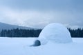 Real snow igloo house in the winter Carpathian mountains