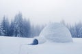 Real snow igloo house in the winter mountains