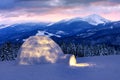 Real snow igloo house in the winter mountains