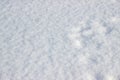 Real snow surface to use background texture. Pure fluffy snow. Just falling white snow. White snowflakes. Pure fluffy