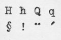 Real typewriter font alphabet with letters H, Q and symbols