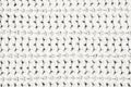 Real white knit texture. Background, pattern concept. Knitted fabric made of heathered yarn Royalty Free Stock Photo