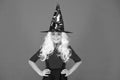 Real witch in disguise. Little child in witch costume. Halloween party. Small girl in black witch hat. Autumn holiday Royalty Free Stock Photo