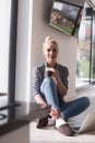 Young woman drinking coffee enjoying relaxing lifestyle Royalty Free Stock Photo