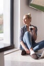 Young woman drinking coffee enjoying relaxing lifestyle Royalty Free Stock Photo