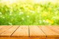 Real wood table top texture on blur flower garden background Royalty Free Stock Photo