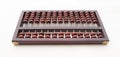 Wooden Chinese Abacus - Suanpan classic ancient calculator upside down view on white background