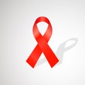 Realistic Aids Awareness red ribbon isolated on white background
