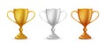 Realistic award winner cups. Golden, silver and bronze trophy set. Vector illustration.