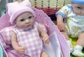 Realistic baby doll in the toy store