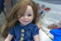 Realistic baby doll in the toy store