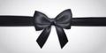 Realistic black bow with ribbon isolated on white. Element for decoration gifts, greetings, holidays. Vector illustration